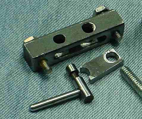 Bandsaw cam for spacer bolt